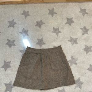 Tweed skirt with slit pockets